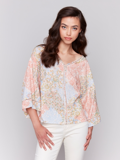 Blouse détails encolure et manche