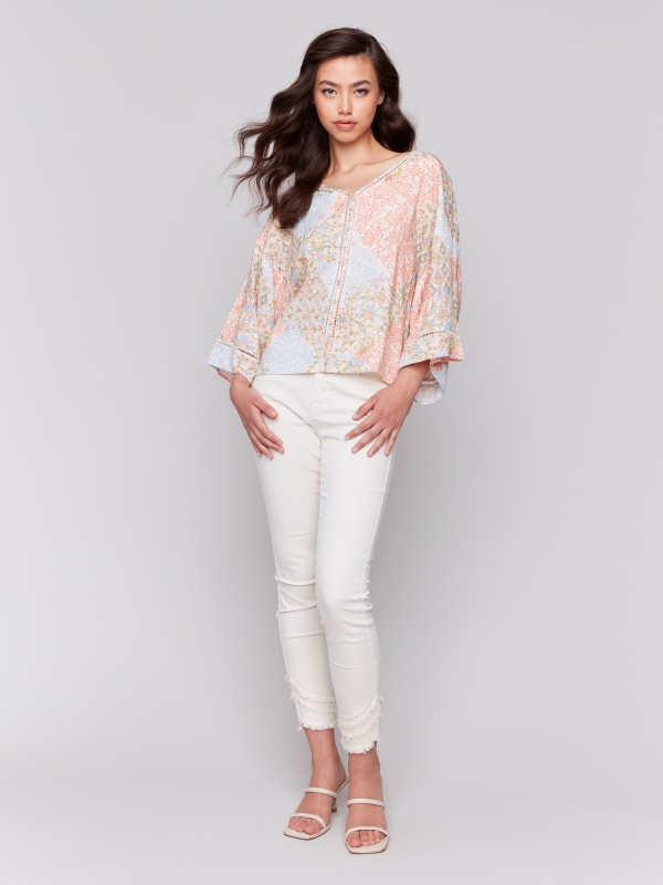 Blouse détails encolure et manche