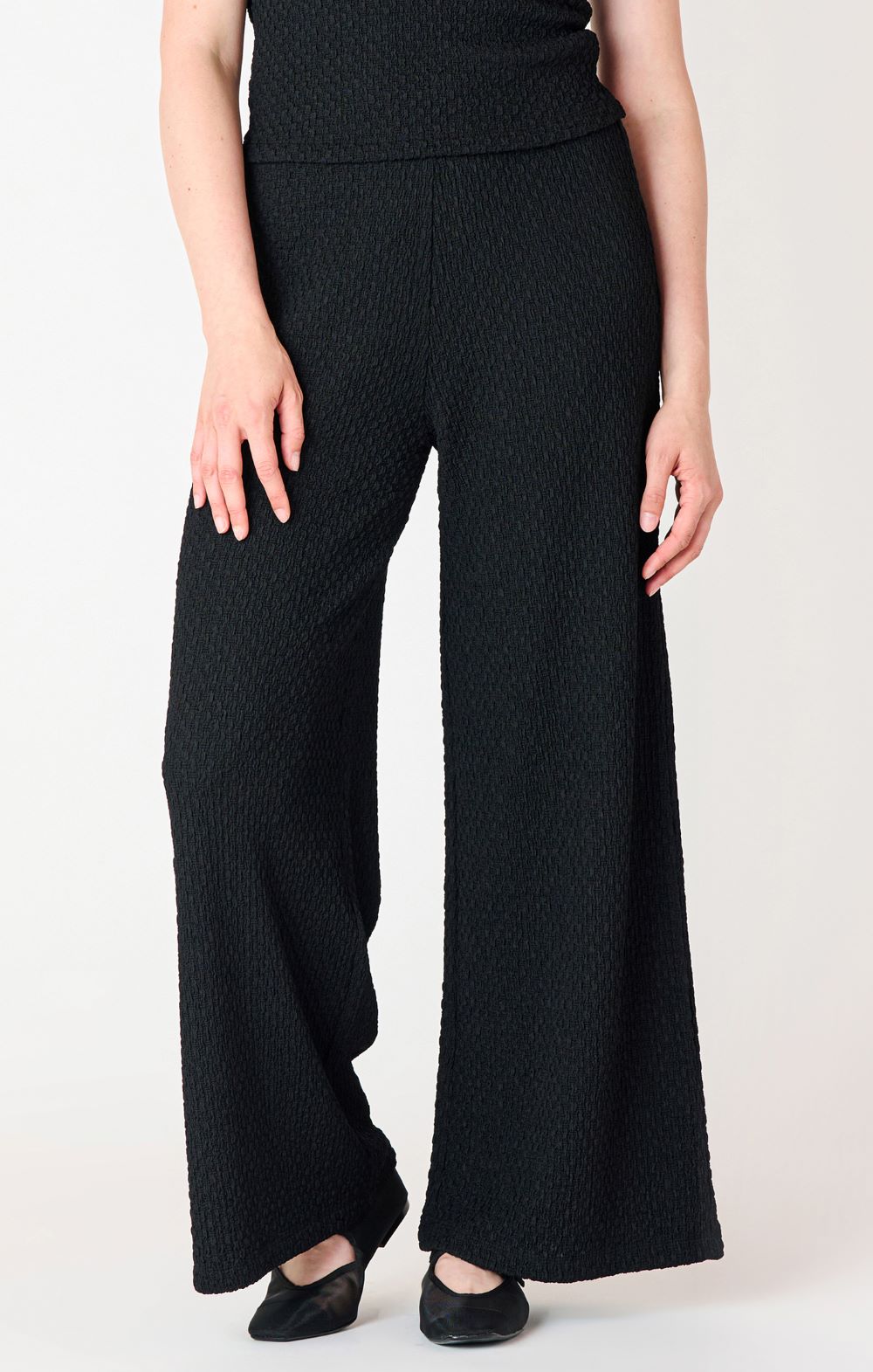 Pantalon chic texturé jambes larges 