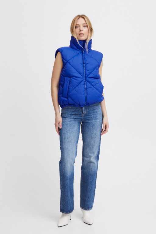 VESTE SANS MANCHES COURTE UNIE