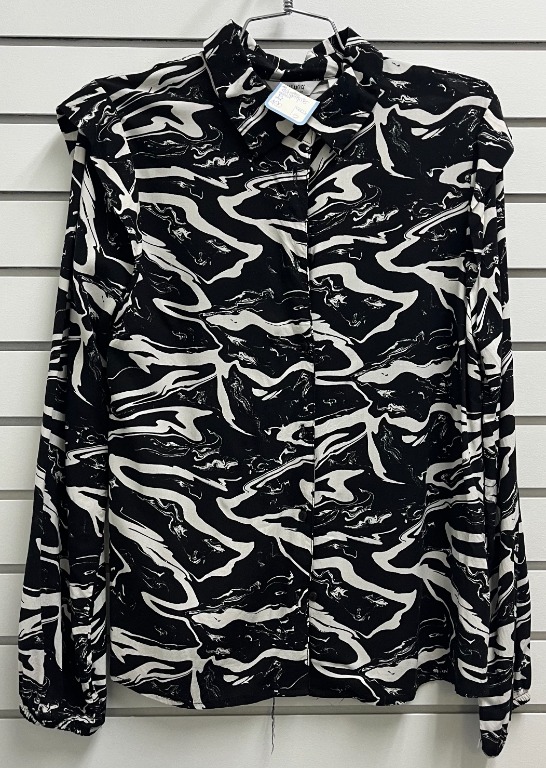 Blouse chic motif manches longues épaules bouffantes 