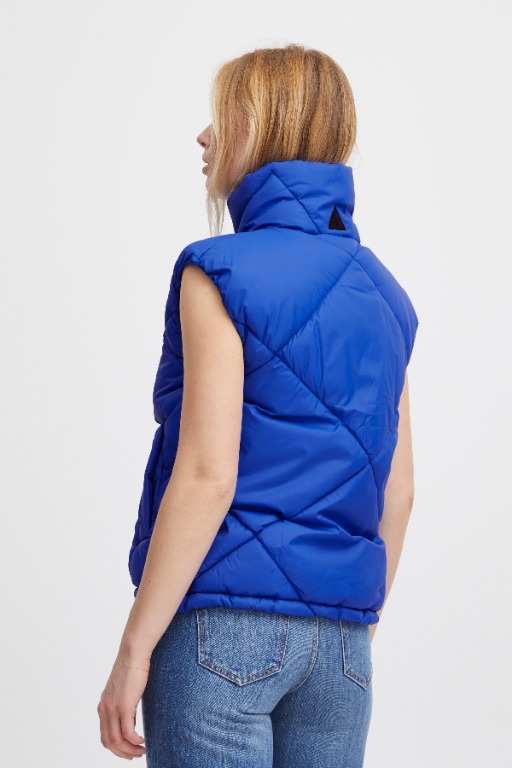 VESTE SANS MANCHES COURTE UNIE
