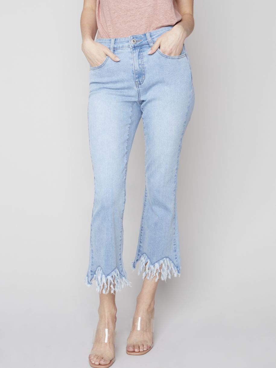 JEANS FLARE FRANGES BAS TAILLE HAUTE